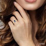 6x4MM Oval Cut Sapphire and 1/5 Ctw Round Cut Diamond Ring in 14K Yellow Gold