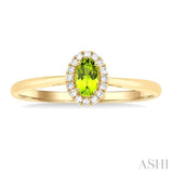 5x3 MM Oval Shape Peridot and 1/20 Ctw Single Cut Diamond Halo Semi-Precious Ring in 10K Yellow Gold
