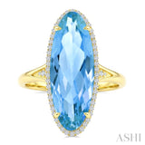 22X8 MM Evoque Gemstones Oval Shape Blue Topaz and 1/5 Ctw Round Cut Diamond Semi-Precious Ring in 14K Yellow Gold