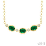 4X3MM Oval Cut Emerald and 1/50 Ctw Bezel Set Round Cut Diamond Precious Fashion Necklace in 10K Yellow Gold
