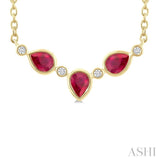 4X3MM Pear Cut Ruby and 1/50 Ctw Bezel Set Round Cut Diamond Precious Fashion Necklace in 10K Yellow Gold