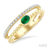 4x3 MM Oval Shape Emerald and 1/5 Ctw Round Cut DiamondsPrecious Fashion Split Twin Ring in 10K Yellow Gold
