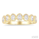 1.00 Ctw 7-Stone Bezel Set Oval Cut Diamond Fashion Band in 14K Yellow Gold