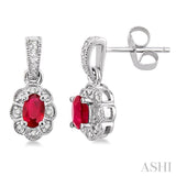 5x3mm Oval Cut Ruby and 1/10 Ctw Single Cut Diamond Earrings in 14K White Gold