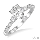 7/8 ctw Pear & Round Cut Diamond Engagement Ring With 1/2 ct Pear Cut Center Stone in 14K White Gold