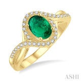 1/5 Ctw Bypass Split Shank 7X5MM Oval Cut Emerald and Round Cut Diamond Precious Ring in 14K Yellow Gold