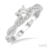 5/8 Ctw Round Center Diamond Twisted Ladies Engagement Ring with 1/2 Ct Round Cut Center Stone in 14K White Gold